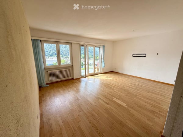 Vista lago Caslano 4.5 locali con posto auto e balconi 1