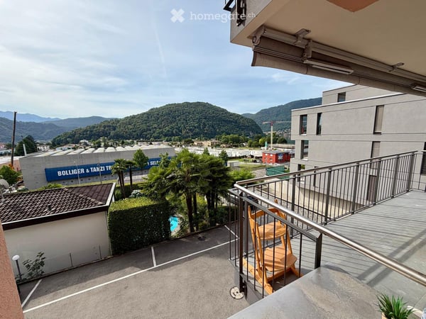 Vista lago Caslano 4.5 locali con posto auto e balconi 3