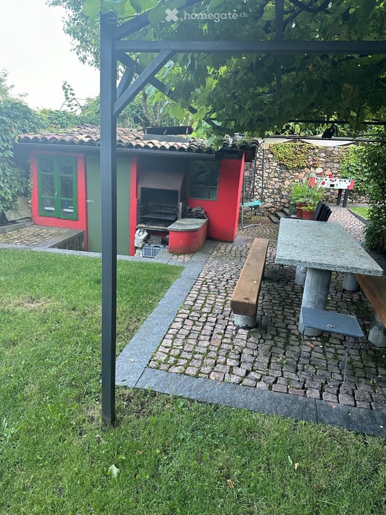 Casa con giardino a Carona 4