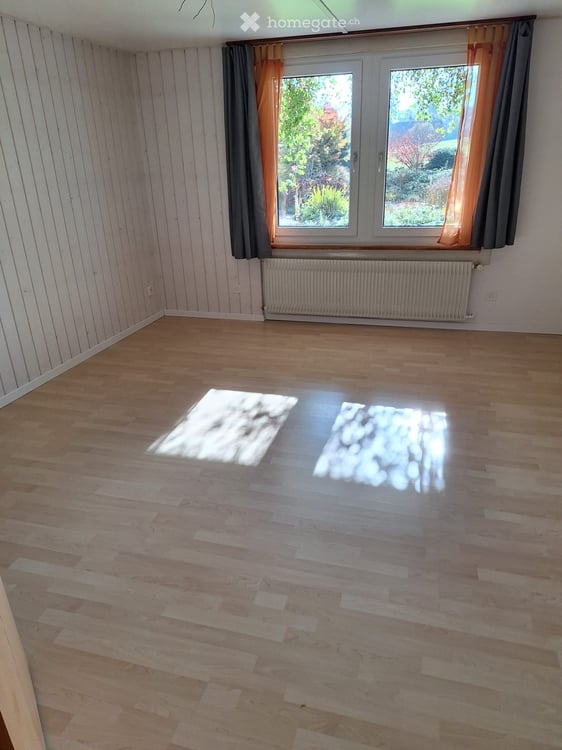 Parterrewohnung mit eigenem Sitz- & Rasenplatz in 3 Fam.Haus 5