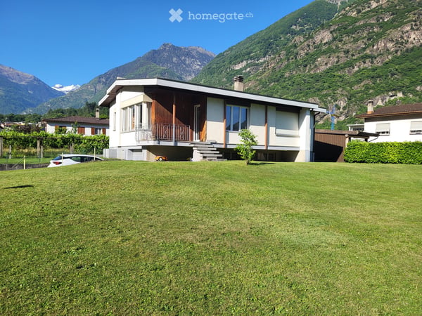Casa unifamigliare + terreno annesso 1
