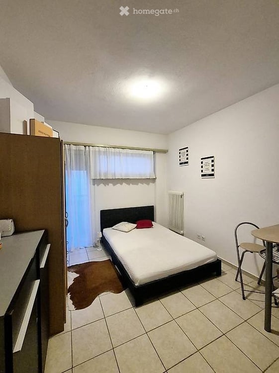 Lugano, studio arredato, con balcone 2