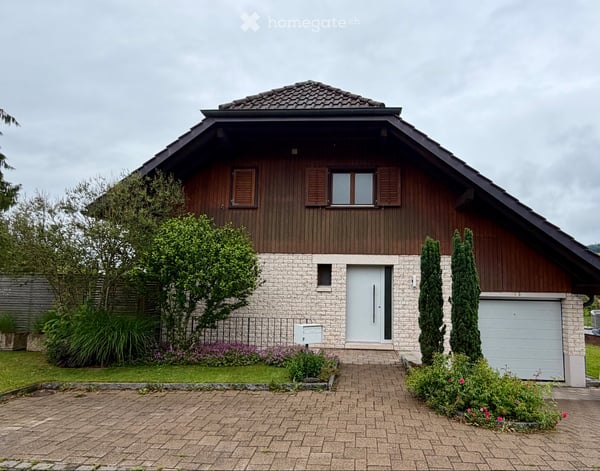 Charmantes Einfamilienhaus mit traumhaftem Garten 1