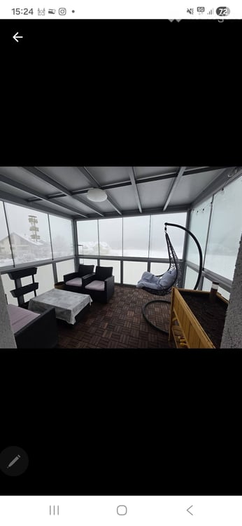 Top Lage 3.5-Zimmer Wohnung mit Wintergarten & Garage 1