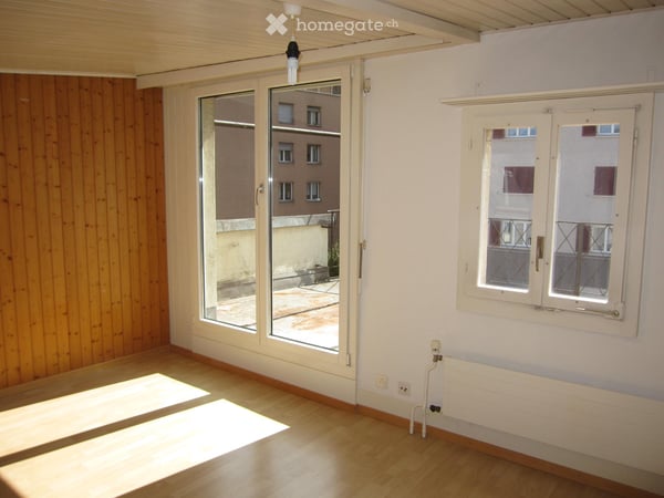 Heimelige 2.5 Zimmer-Wohnung mit grosser Dachterrasse 1
