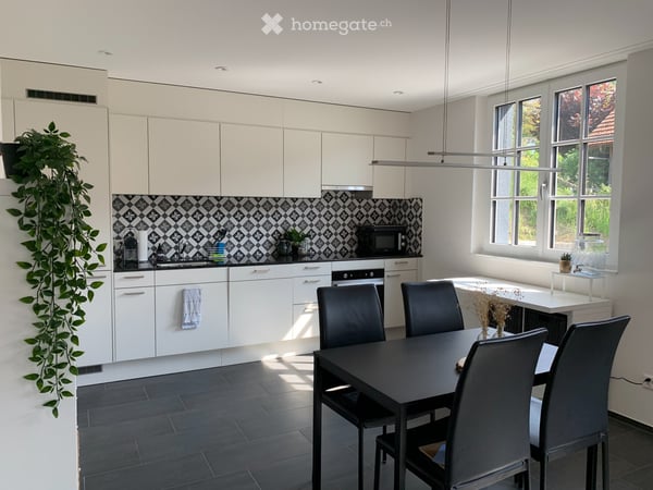 Neubau-Wohnung im Dorfkern - mit sehr schönem Balkon 1