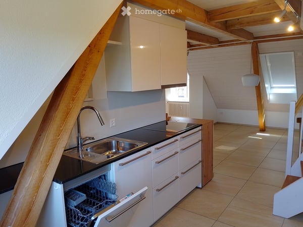 Schöne Dachwohnung in Uzwil mit Aussenparkplatz und Garten 1