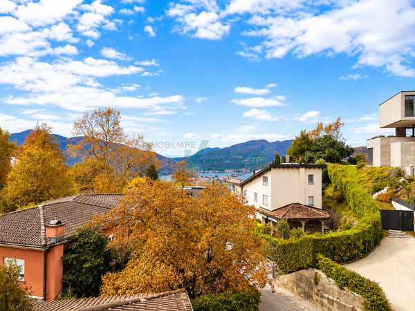Magnifico attico 4,5 locali con grande terrazza e parziale vista lago 6