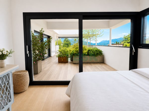 Magnifico attico 4,5 locali con grande terrazza e parziale vista lago 7