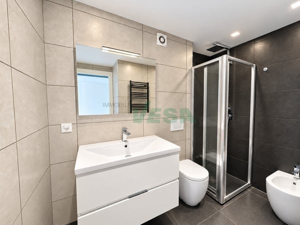 Moderno e luminoso appartamento 2 locali con splendida vista lago 7