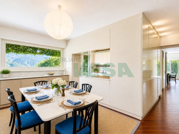 Splendido attico 6,5 locali con fantastica vista lago e bel giardino 8