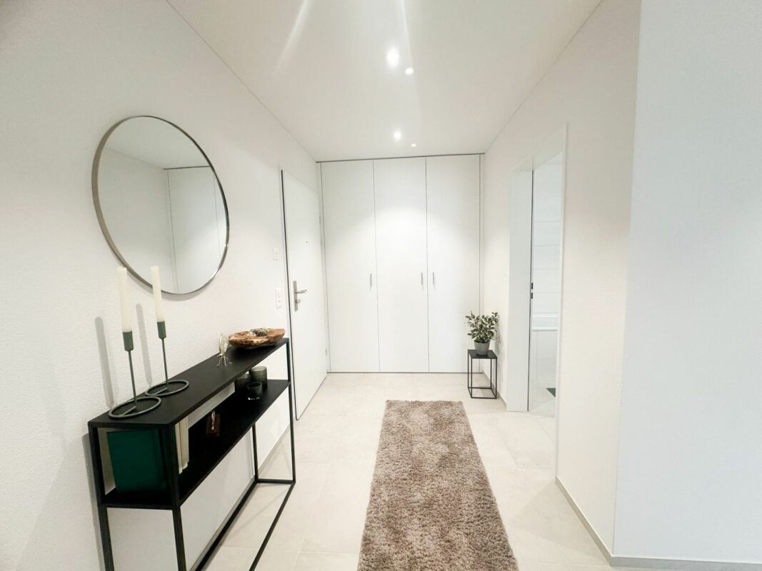 Wohngenuss im Blumenpark - Erdgeschosswohnung mit zwei Sitzplätzen