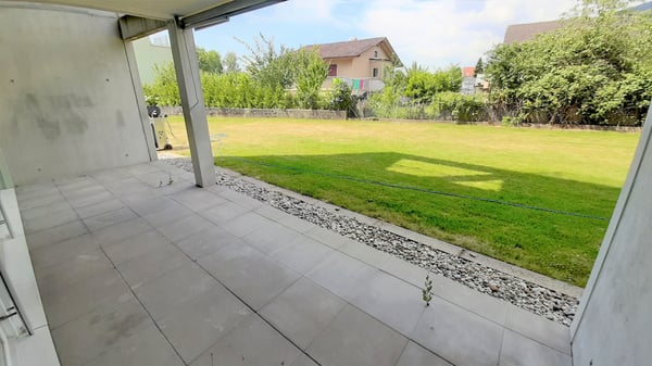 Modern wohnen mit Gartensitzplatz und Blick ins Grüne! 11