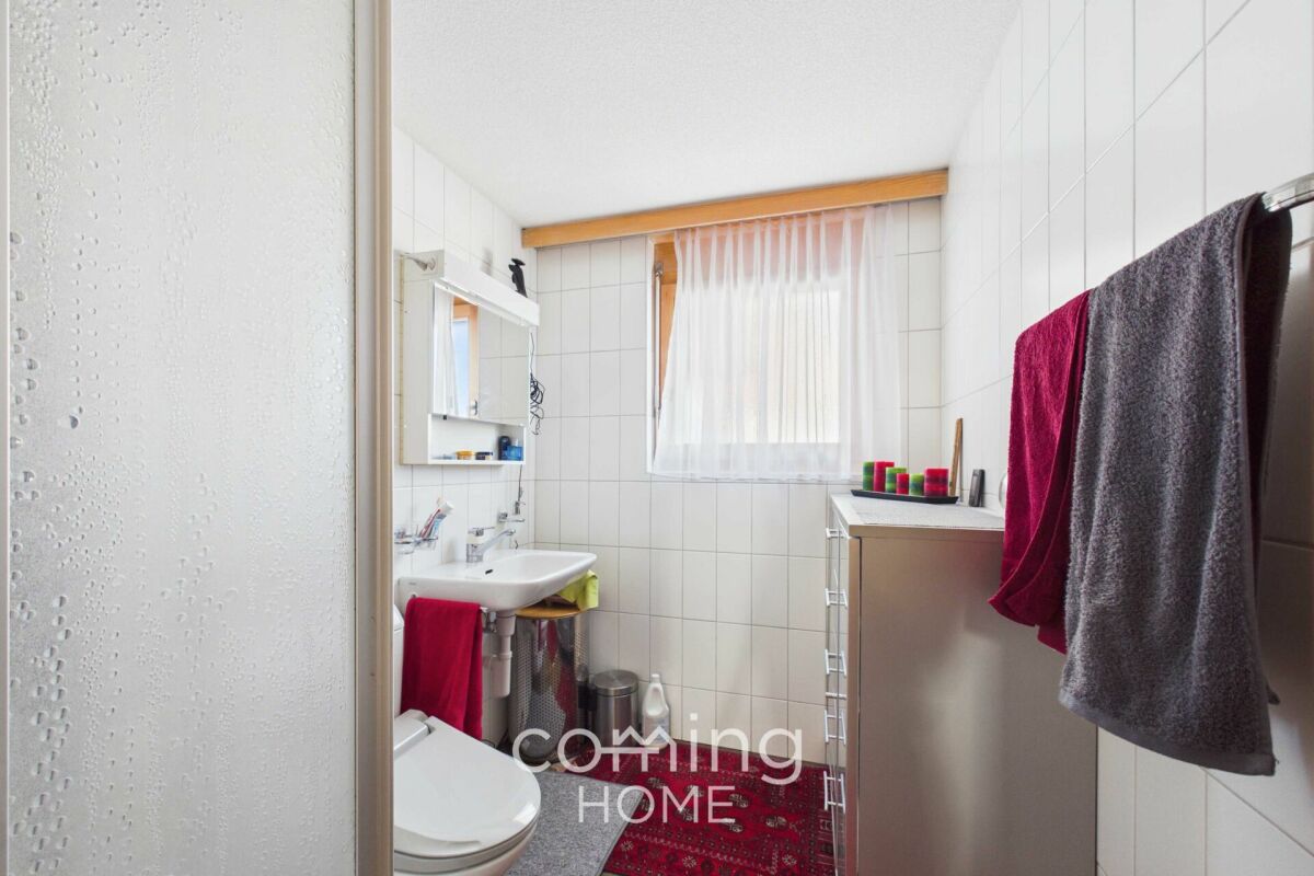 Appartement confortable de 3,5 pièces avec jardin à Engersch, offrant une vue panoramique