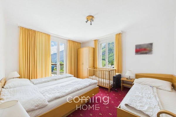 Sonnige 3.5 Zimmerwohnung in Leukerbad mit Bergsicht und Balkon 1