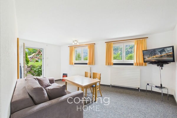 Gepflegte 3.5 Zimmerwohnung in Leukerbad mit sonniger Terrasse und Bergsicht 1