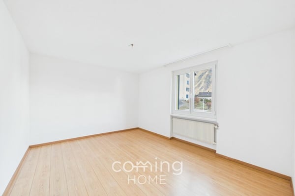 Sonnige 3.5-Zimmerwohnung mit Balkon und Bergsicht in ruhiger Lage 11