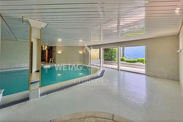 Elegante Triplex-Wohnung in Porza mit Seeblick, privatem Garten, Gemeinschaftspool & Sauna zum Verkauf 7