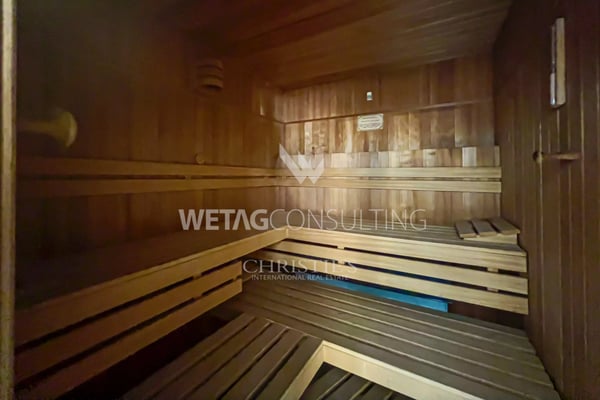 Elegante Triplex-Wohnung in Porza mit Seeblick, privatem Garten, Gemeinschaftspool & Sauna zum Verkauf 12