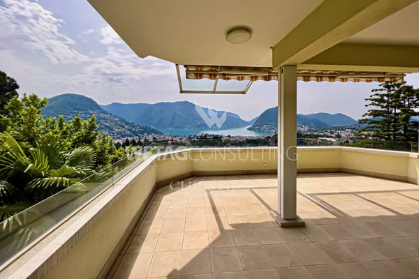 Elegante Triplex-Wohnung in Porza mit Seeblick, privatem Garten, Gemeinschaftspool & Sauna zum Verkauf 8