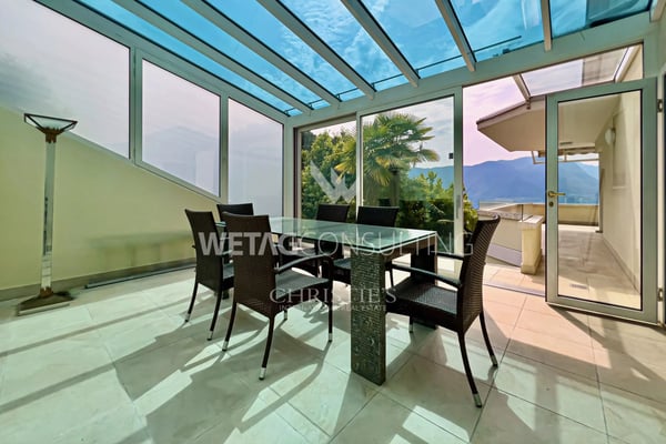 Elegante Triplex-Wohnung in Porza mit Seeblick, privatem Garten, Gemeinschaftspool & Sauna zum Verkauf 6