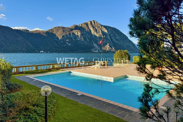 Lugano-Bissone: Wohnung mit direktem Zugang zum See, Aussenpool, Seeblick & Bootsplatz zu verkaufen 1