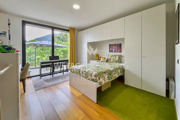 Moderne Design-Villa mit Pool zu verkaufen in Lugano-Sessa, eingebettet im Grünen 8