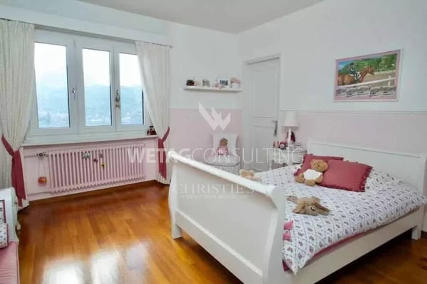 Lugano-Figino: Elegante Villa mit traumhafter Aussicht auf den Luganersee & Indoor-Pool zu verkaufen 8