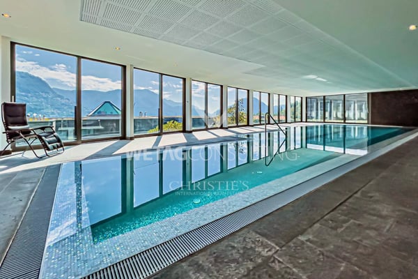Wohnung in Porza mit privatem Garten & Blick auf den See zu verkaufen - auch als Zweitwohnsitz nutzbar 6