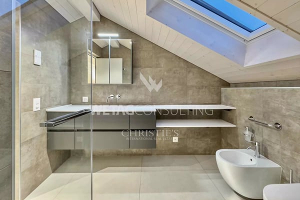 Residenz mit 4 Wohnungen & 2 Gewerbeflächen zu verkaufen in unmittelbarer Nähe der Seepromenade in Ascona 12