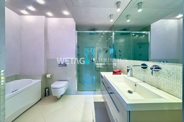 Zum Verkauf in Lugano: Moderne Duplex-Wohnung mit privatem Garten & herrlicher Seesicht, auch als Zweitwohnsitz möglich 8