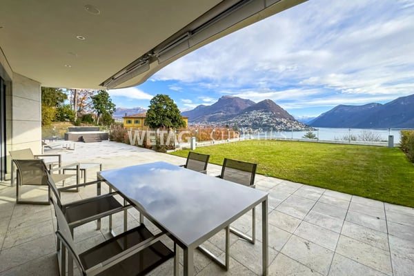 Zum Verkauf in Lugano: Moderne Duplex-Wohnung mit privatem Garten & herrlicher Seesicht, auch als Zweitwohnsitz möglich 2