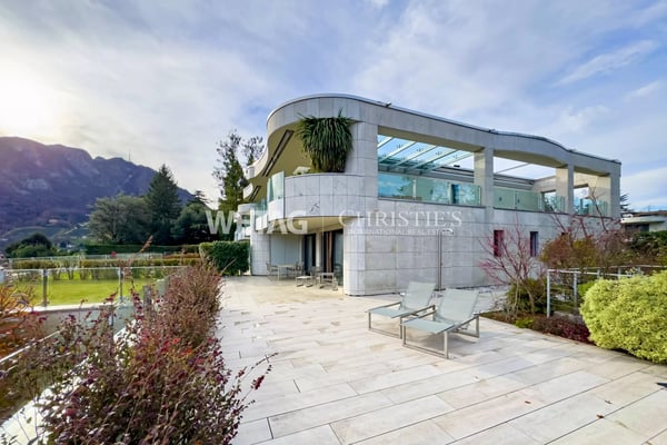 Zum Verkauf in Lugano: Moderne Duplex-Wohnung mit privatem Garten & herrlicher Seesicht, auch als Zweitwohnsitz möglich 12