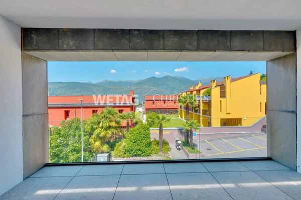 Zu verkaufen: Moderne 3.5-Zimmer-Wohnung in Lugano-Comano, kürzlich renoviert, ideal als Erst- oder Zweitwohnsitz 2