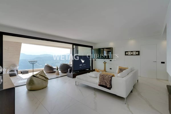 Zum Verkauf in Lugano-Vernate: Moderne Attikawohnung mit spektakulärer Aussicht auf den Luganersee & privatem Garten 7