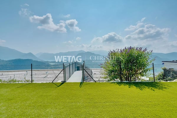 Zum Verkauf in Lugano-Vernate: Moderne Attikawohnung mit spektakulärer Aussicht auf den Luganersee & privatem Garten 13