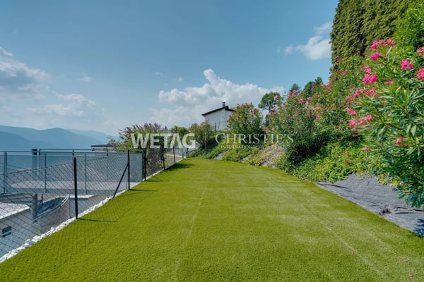 Zum Verkauf in Lugano-Vernate: Moderne Attikawohnung mit spektakulärer Aussicht auf den Luganersee & privatem Garten 6
