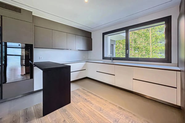 Montagnola: Moderne 5.5-Zimmer-Wohnung mit Privatgarten zu vermieten 4