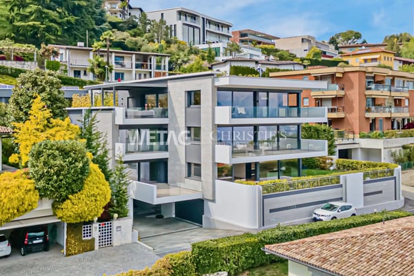 Montagnola: Moderne 5.5-Zimmer-Wohnung mit Privatgarten zu vermieten 1