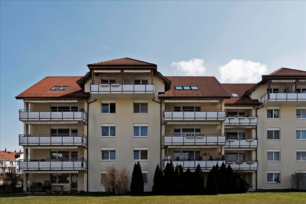 Moderne Wohnung mit Gartensitzplatz! 1