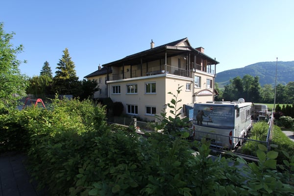 Wohn-Gewerbehaus mit Bauparzelle und Entwicklungspotential 12