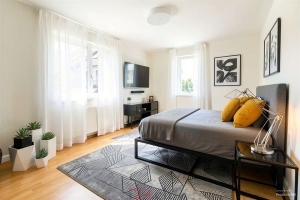 Mehrfamilienhaus mit drei Wohneinheiten im Familienfreundlichem Quartier 12