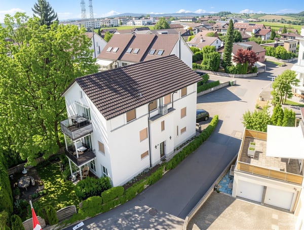 Mehrfamilienhaus mit drei Wohneinheiten im familienfreundlichen Quarti 4