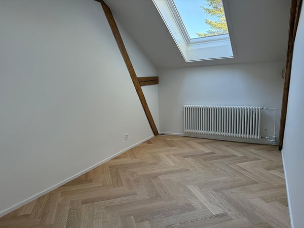 Exklusive 5.5-Dachwohnung in sanierter Villa! 6