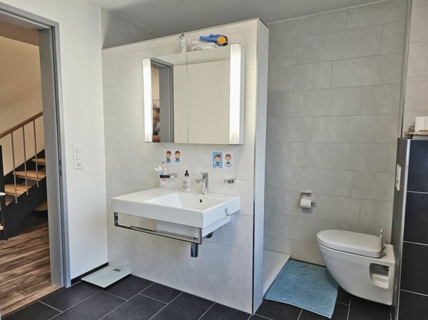 Exklusive 1.5-Zimmer-Maisonette-Wohnung an unverbaubarer Südhanglage mit spektakulärer Aussicht 14