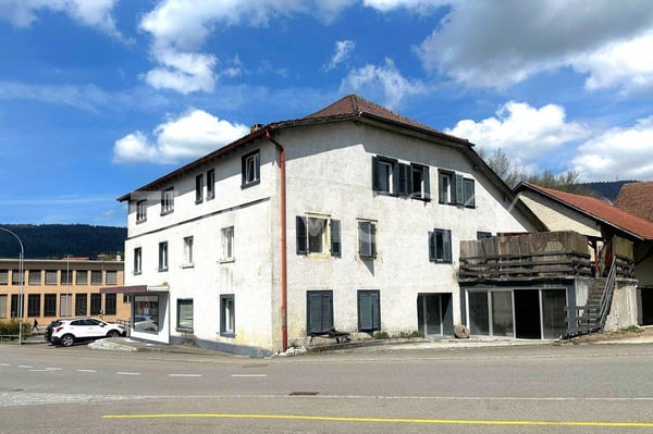 Ertragsstarkes Mehrfamilienhaus mit Wohn- und Gewerbeflächen 1