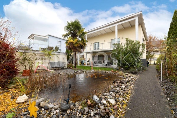 Stilvolles Eigenheim mit grüner Wohlfühloase 1