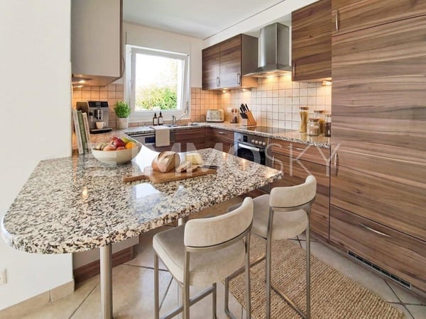 Bel appartement 4.5 pièces au rez-de-chaussée avec jardin 2