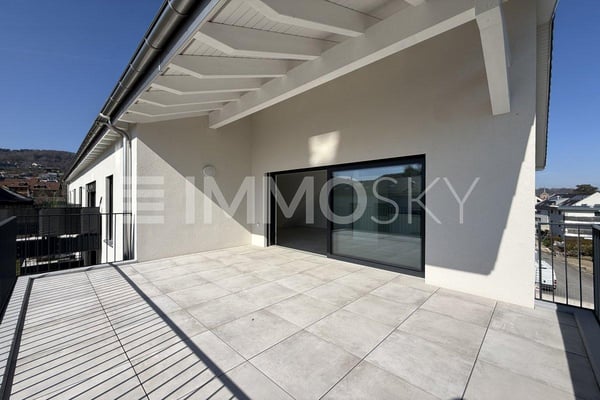 3.5 pièces neuf avec combles d'env. 69 m² et grand balcon (Lot B5-8.1) 1