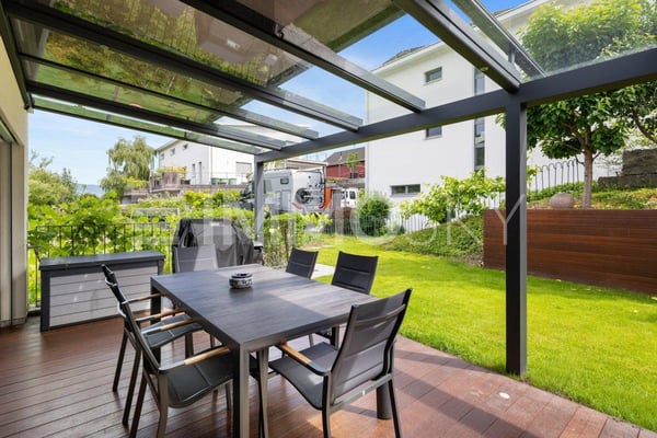 Modernes Raumwunder mit Garten 2